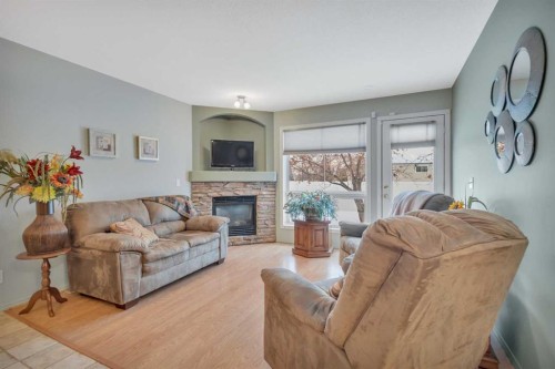 6 Jenkins Drive, Red Deer, AB - Indoor Photo Showing Living Room With Fireplace