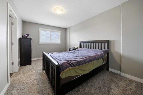71 Palmer Circle, Blackfalds, AB - Indoor Photo Showing Bedroom