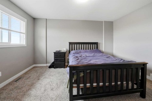 71 Palmer Circle, Blackfalds, AB - Indoor Photo Showing Bedroom