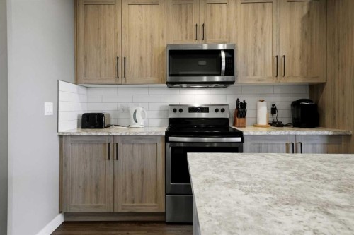 71 Palmer Circle, Blackfalds, AB - Indoor Photo Showing Kitchen