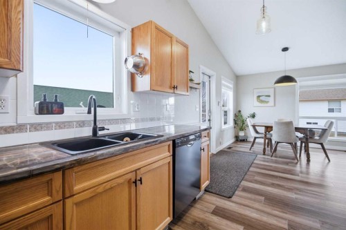 252 Lancaster Drive, Red Deer, AB - Indoor Photo Showing Kitchen With Double Sink