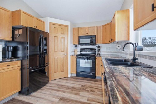 252 Lancaster Drive, Red Deer, AB - Indoor Photo Showing Kitchen With Double Sink