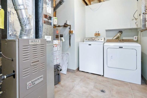 140 Lanterman Close, Red Deer, AB - Indoor Photo Showing Laundry Room