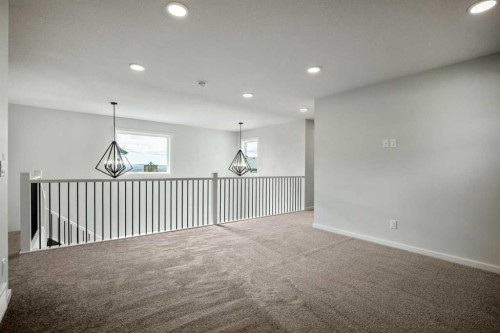 27 Heritage Link, Cochrane, AB - Indoor Photo Showing Other Room