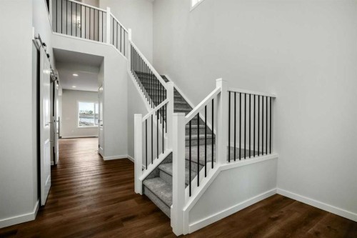 27 Heritage Link, Cochrane, AB - Indoor Photo Showing Other Room