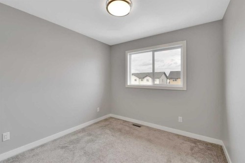 15 Iron Gate Boulevard, Sylvan Lake, AB - Indoor Photo Showing Other Room