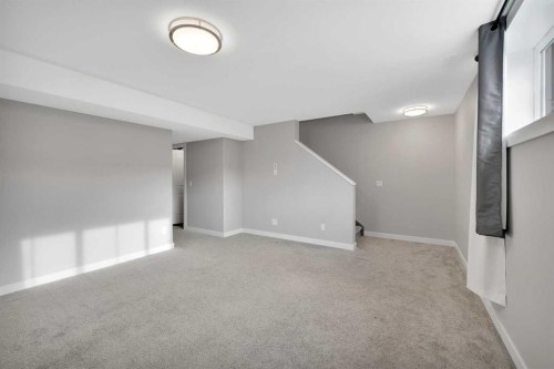 15 Iron Gate Boulevard, Sylvan Lake, AB - Indoor Photo Showing Other Room