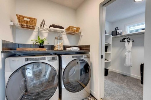 9 Amblefield View Nw, Calgary, AB - Indoor Photo Showing Laundry Room