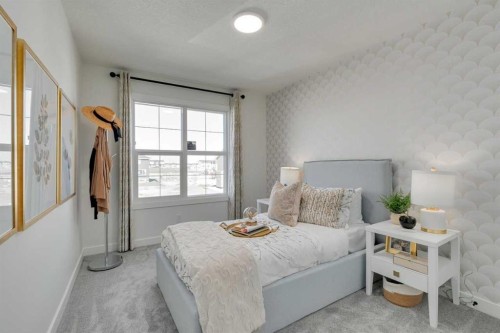 568 Buffaloberry Manor Se, Calgary, AB - Indoor Photo Showing Bedroom