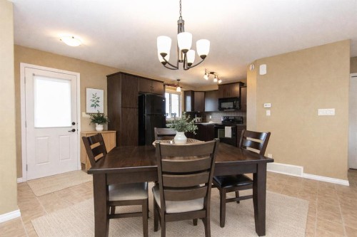 114 Redwood Boulevard, Springbrook, AB - Indoor Photo Showing Dining Room