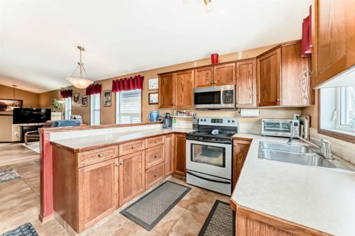 633 Lancaster Drive, Red Deer, AB - Indoor Photo Showing Kitchen With Double Sink