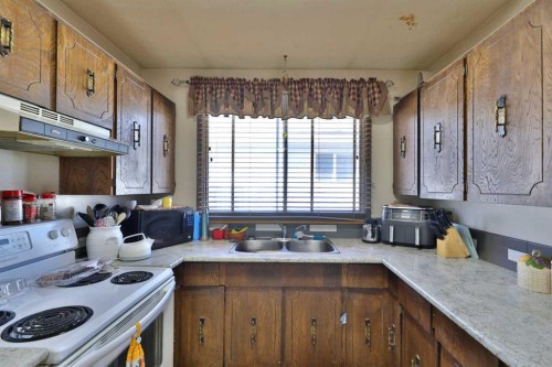 6403B 49 Avenue, Camrose, AB - Indoor Photo Showing Kitchen With Double Sink