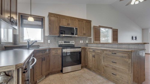 42 Eastpointe, Blackfalds, AB - Indoor Photo Showing Kitchen With Double Sink
