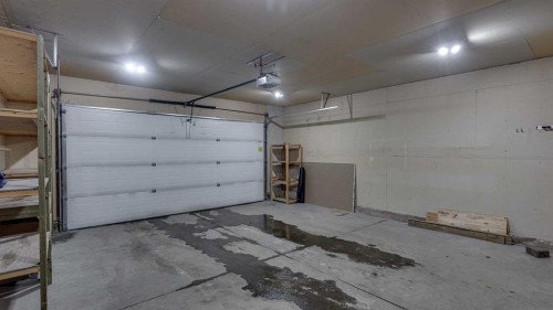 42 Eastpointe, Blackfalds, AB - Indoor Photo Showing Garage