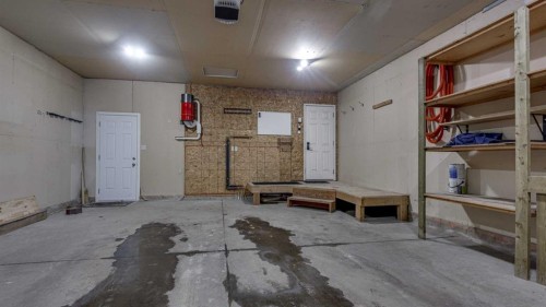 42 Eastpointe, Blackfalds, AB - Indoor Photo Showing Garage