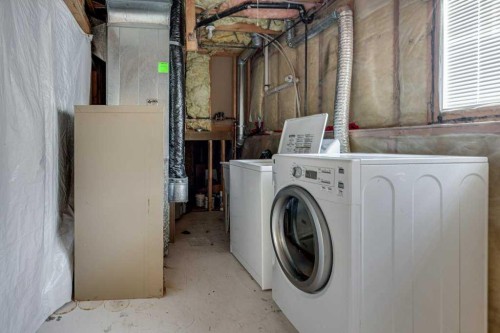 68 Herder Drive, Sylvan Lake, AB - Indoor Photo Showing Laundry Room