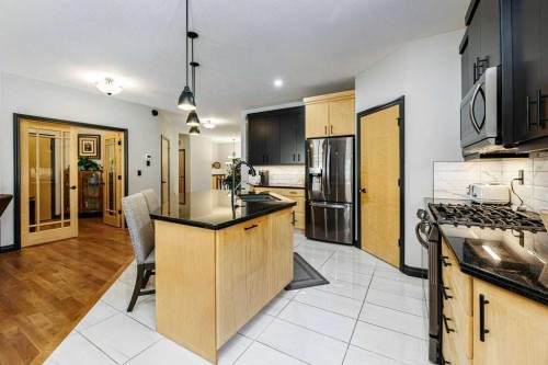 6 Cranna Place, Lacombe, AB - Indoor Photo Showing Kitchen With Upgraded Kitchen