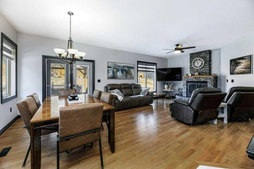 6 Cranna Place, Lacombe, AB - Indoor With Fireplace