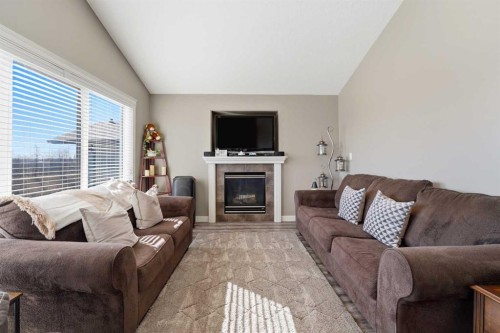 156 Kershaw Close, Red Deer, AB - Indoor Photo Showing Living Room With Fireplace