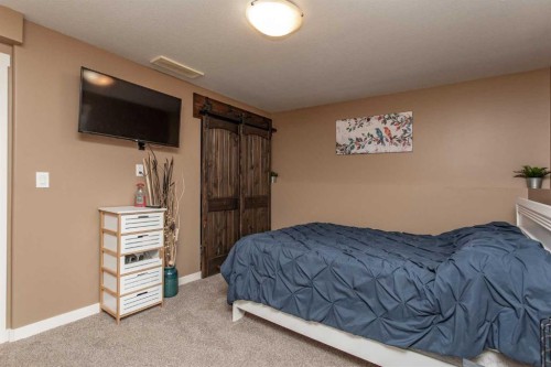 68 Garden Road, Lacombe, AB - Indoor Photo Showing Bedroom