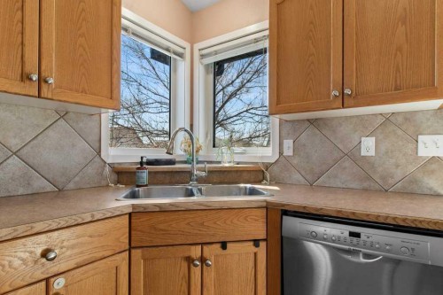12 Hansen Close, Sylvan Lake, AB - Indoor Photo Showing Kitchen With Double Sink