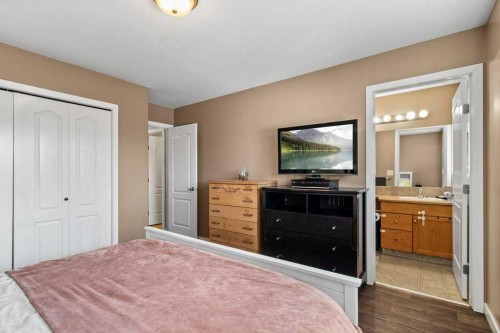 12 Hansen Close, Sylvan Lake, AB - Indoor Photo Showing Bedroom