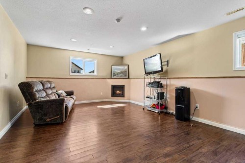 12 Hansen Close, Sylvan Lake, AB - Indoor With Fireplace