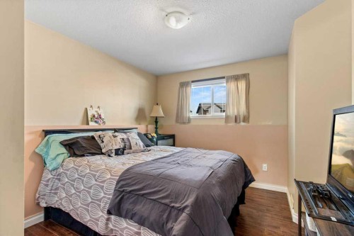 12 Hansen Close, Sylvan Lake, AB - Indoor Photo Showing Bedroom