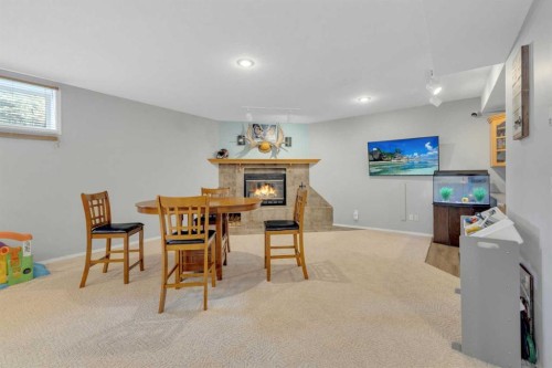 5508 49 Avenue, Alix, AB - Indoor With Fireplace