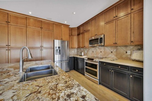 176 Ingle Close, Red Deer, AB - Indoor Photo Showing Kitchen With Double Sink With Upgraded Kitchen
