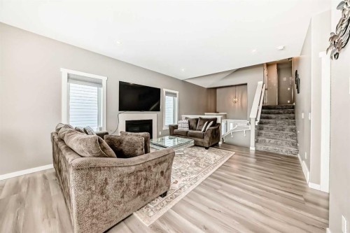 99 Livingston Close, Red Deer, AB - Indoor Photo Showing Living Room With Fireplace