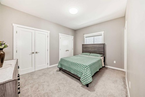 99 Livingston Close, Red Deer, AB - Indoor Photo Showing Bedroom