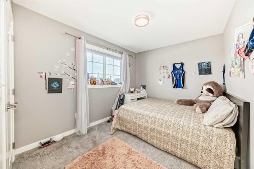 99 Livingston Close, Red Deer, AB - Indoor Photo Showing Bedroom