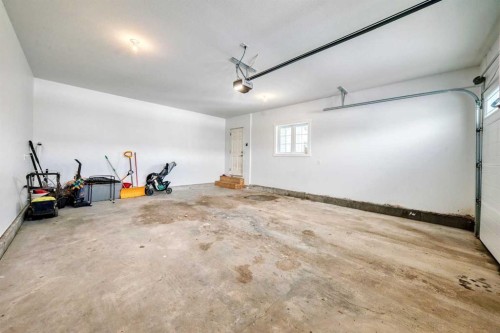 99 Livingston Close, Red Deer, AB - Indoor Photo Showing Garage