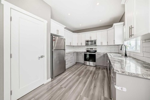 99 Livingston Close, Red Deer, AB - Indoor Photo Showing Kitchen With Stainless Steel Kitchen With Upgraded Kitchen