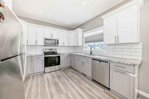 99 Livingston Close, Red Deer, AB - Indoor Photo Showing Kitchen With Stainless Steel Kitchen With Upgraded Kitchen