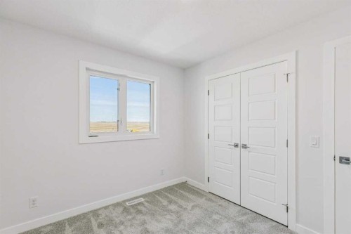 86 Keystone Creek Terrace Ne, Calgary, AB - Indoor Photo Showing Other Room