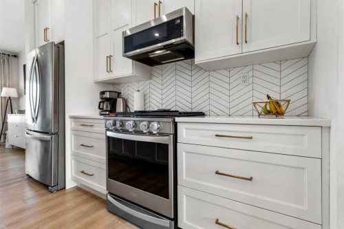 52 Evergreen Way, Red Deer, AB - Indoor Photo Showing Kitchen With Stainless Steel Kitchen With Upgraded Kitchen