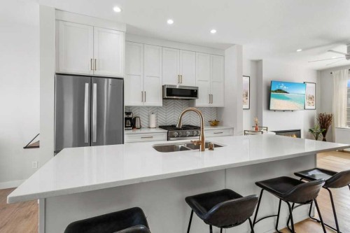 52 Evergreen Way, Red Deer, AB - Indoor Photo Showing Kitchen With Stainless Steel Kitchen With Double Sink With Upgraded Kitchen