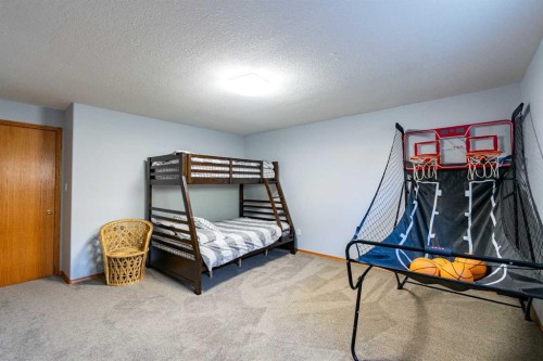 5404 49A Avenue, Alix, AB - Indoor Photo Showing Bedroom