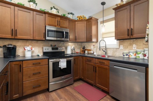 4410 75 Street, Camrose, AB - Indoor Photo Showing Kitchen With Double Sink
