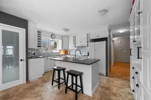 6609 Enevold Drive, Camrose, AB - Indoor Photo Showing Kitchen With Upgraded Kitchen