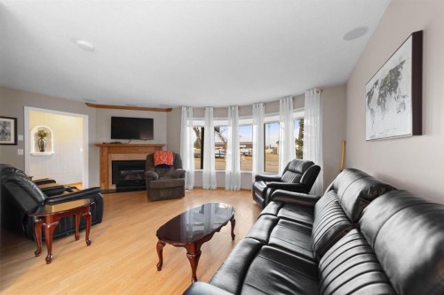 6609 Enevold Drive, Camrose, AB - Indoor Photo Showing Living Room With Fireplace