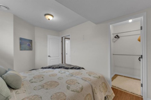 56 Wilkinson Circle, Sylvan Lake, AB - Indoor Photo Showing Bedroom