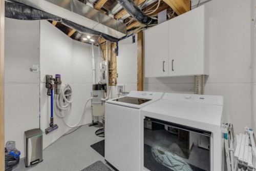 56 Wilkinson Circle, Sylvan Lake, AB - Indoor Photo Showing Laundry Room