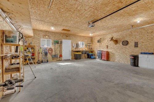 56 Wilkinson Circle, Sylvan Lake, AB - Indoor Photo Showing Garage