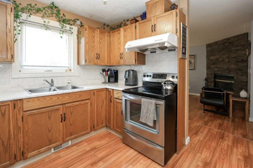 56 Elder Street, Red Deer, AB - Indoor Photo Showing Kitchen With Double Sink