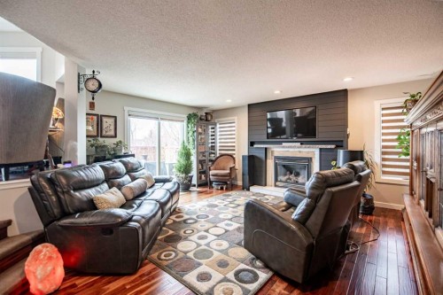14 Eldridge Crescent, Red Deer, AB - Indoor Photo Showing Living Room With Fireplace