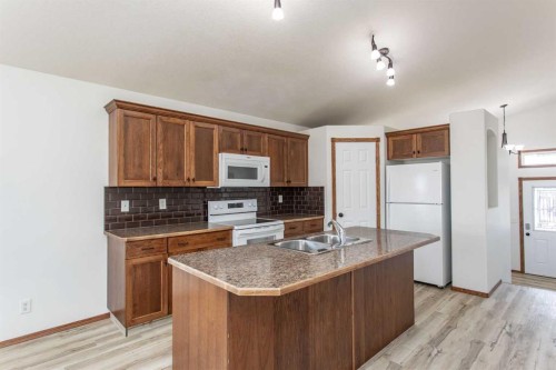 63 Vickers Close, Red Deer, AB - Indoor Photo Showing Kitchen With Double Sink
