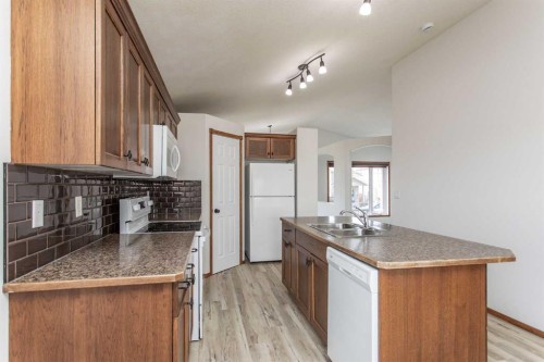 63 Vickers Close, Red Deer, AB - Indoor Photo Showing Kitchen With Double Sink